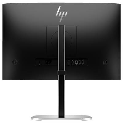 Čierny počítačový monitor zozadu, s rôznymi portmi ako HDMI a USB, namontovaný na striebornom stojane.