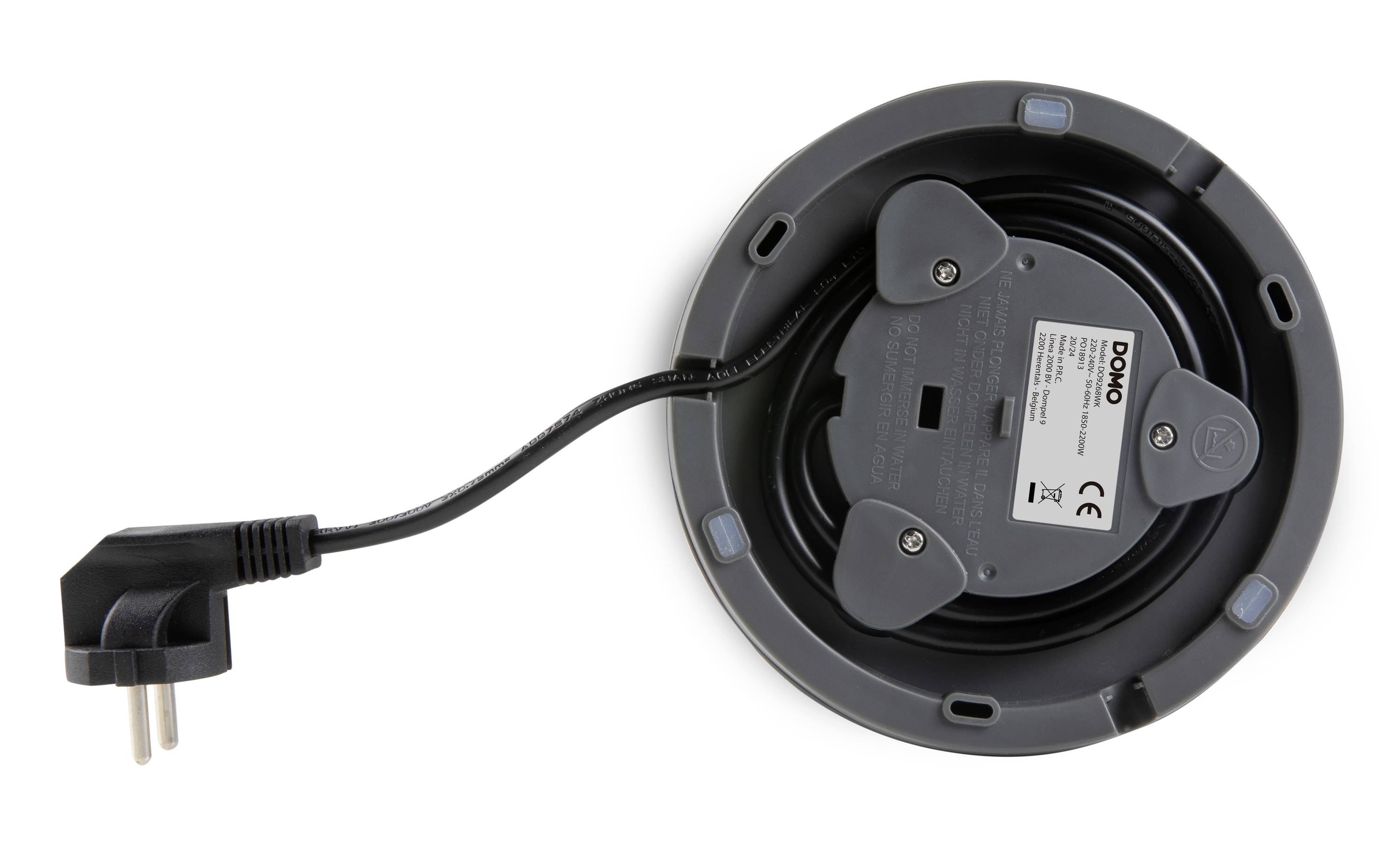 Spodná časť elektrického zariadenia s odpojiteľným napájacím káblom. Na štítku sú uvedené technické detaily a certifikácie.