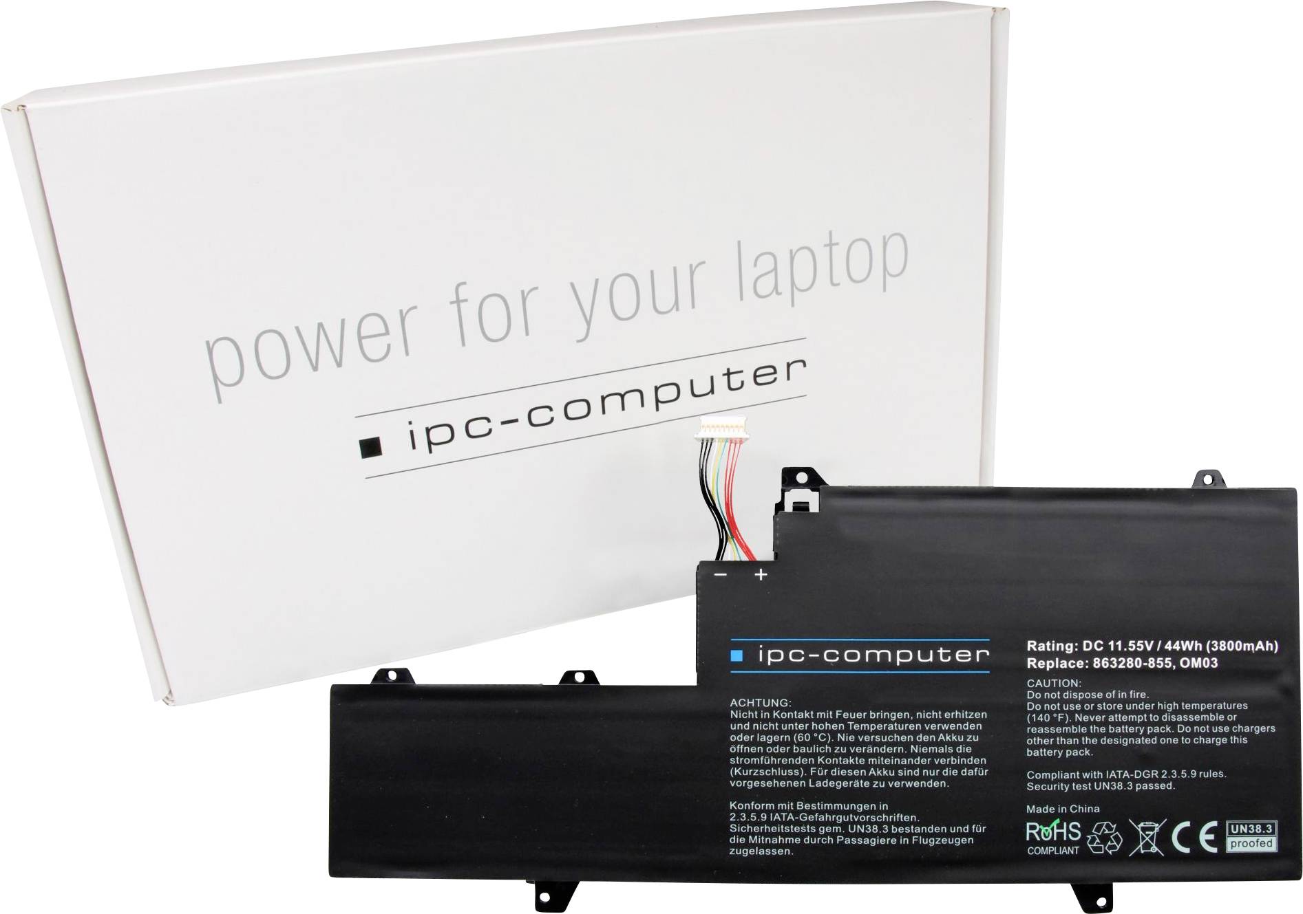 Batéria notebooku od spoločnosti IPC-Computer s obalom v pozadí. Batéria má kapacitu 2800mAh, 48Wh, 11,1V.