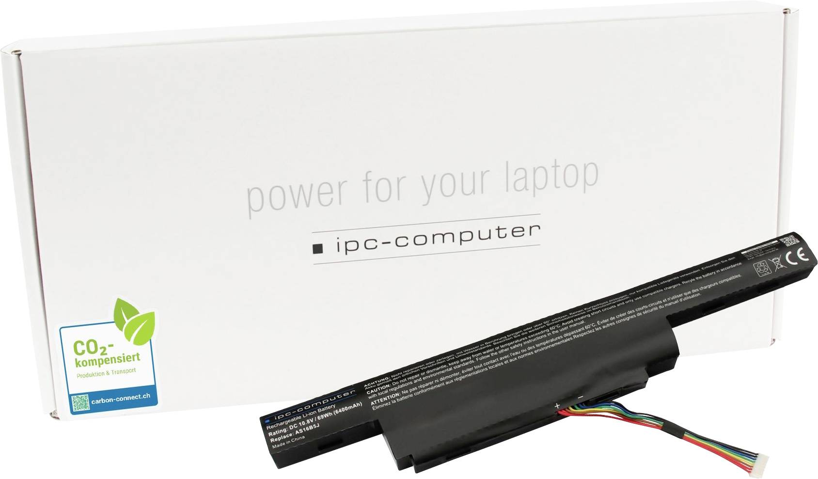 Laptop batéria na bielom kartóne s textom 'energia pre váš laptop'; kompenzované CO₂.