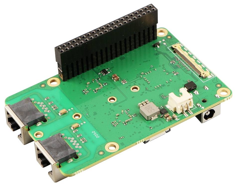 Zelená elektronická doska s viacerými portami a komponentmi.