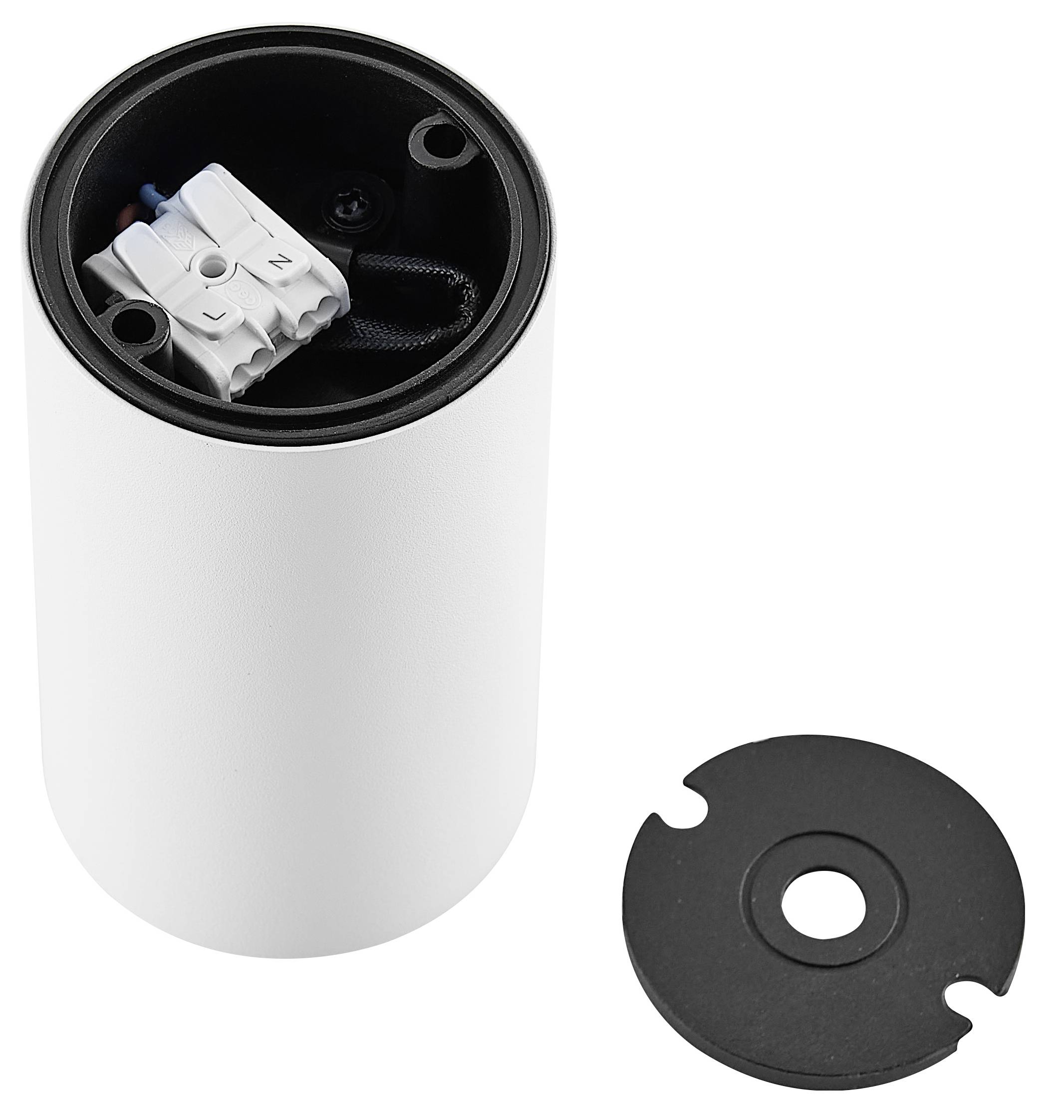 Biely valcovitý svetelný kryt s otvoreným pripojovacím priestorom, zobrazuje zapojenie L a N pólov, vedľa ktorého je okrúhly čierny kryt.