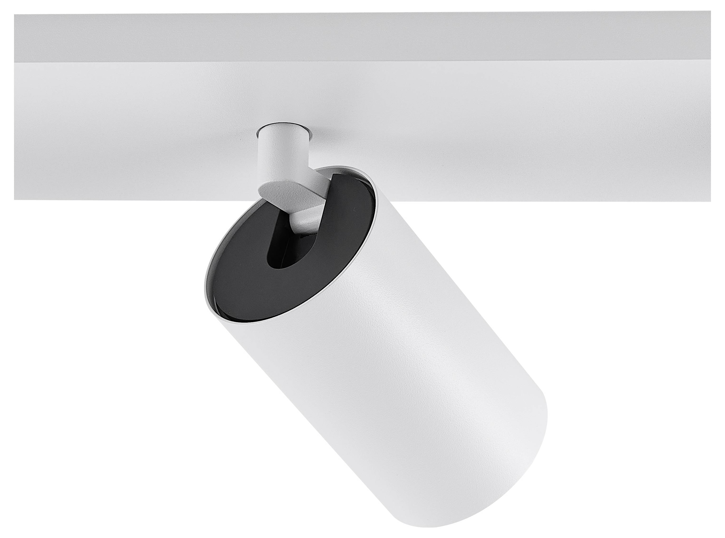 Moderná biela stropná lampa s valcovitým telom, namontovaná na koľajnici. Vhodná pre smerované osvetlenie.