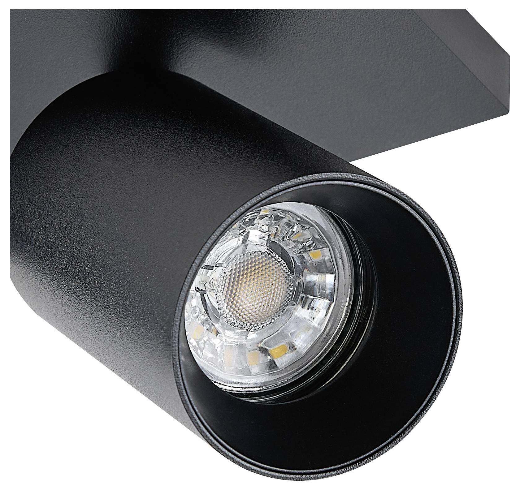 Čierny LED bodový reflektor z kovu, s viditeľným LED svetelným zdrojom, vhodný na akcentové alebo bodové osvetlenie v moderných priestoroch.