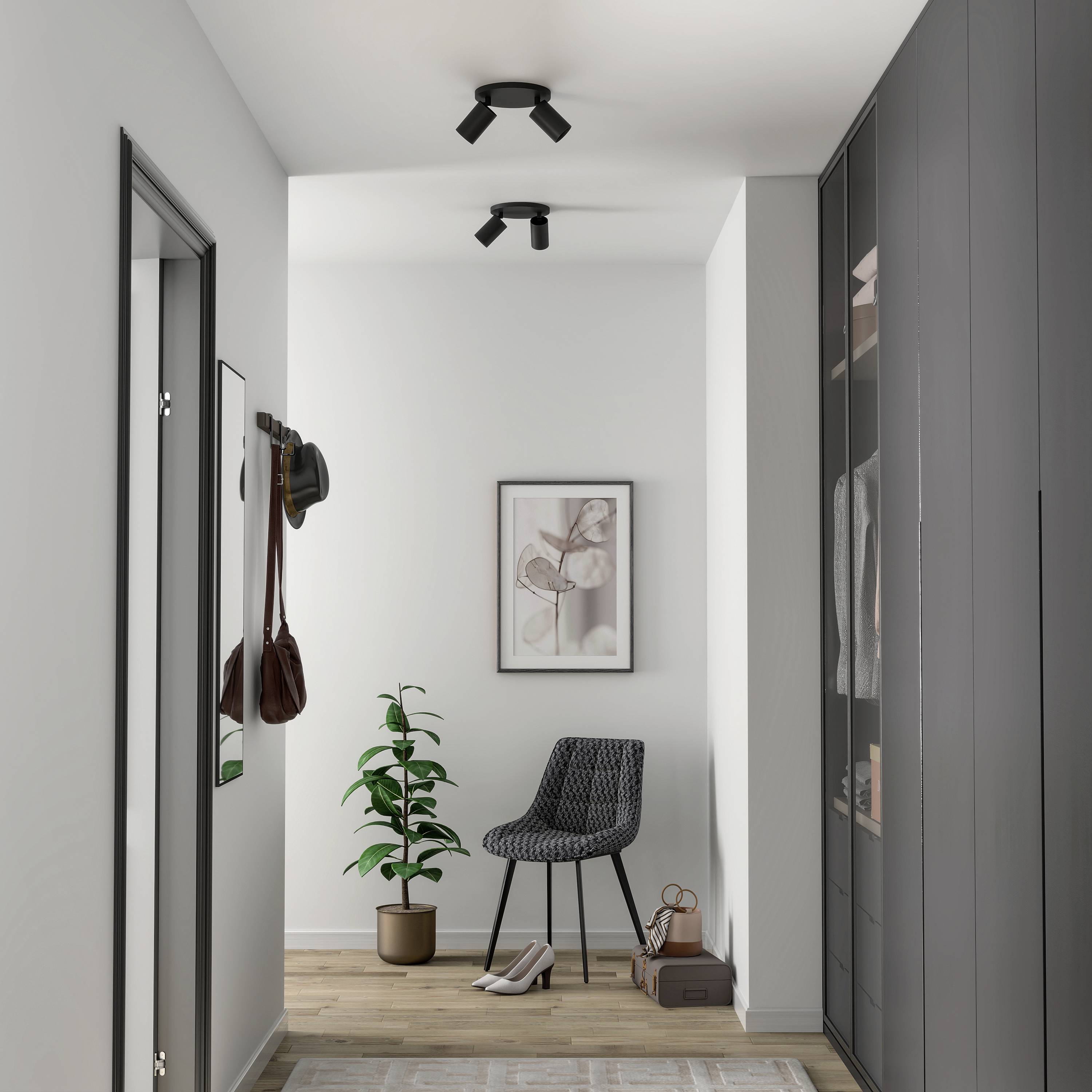 Moderná chodba s drevenou podlahou, čiernou stoličkou, rastlinou a rámom na fotografii na stene. Oblečenie visi na vešiakoch; skriňa vľavo.