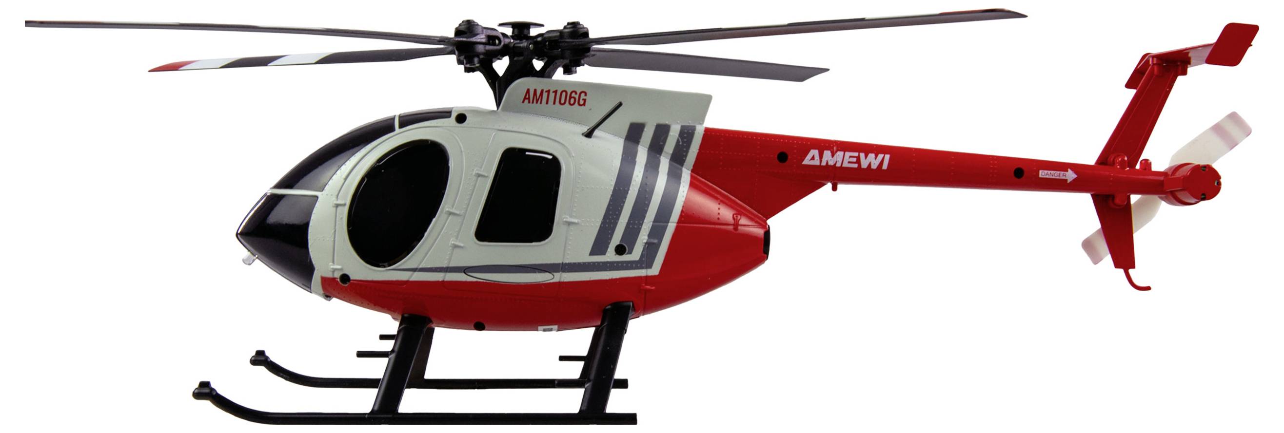 Hračkárska helikoptéra v červeno-bielej farbe s nápisom 'AMEWI' na trupe, stojaca na lyžinách, pohľad z boku.