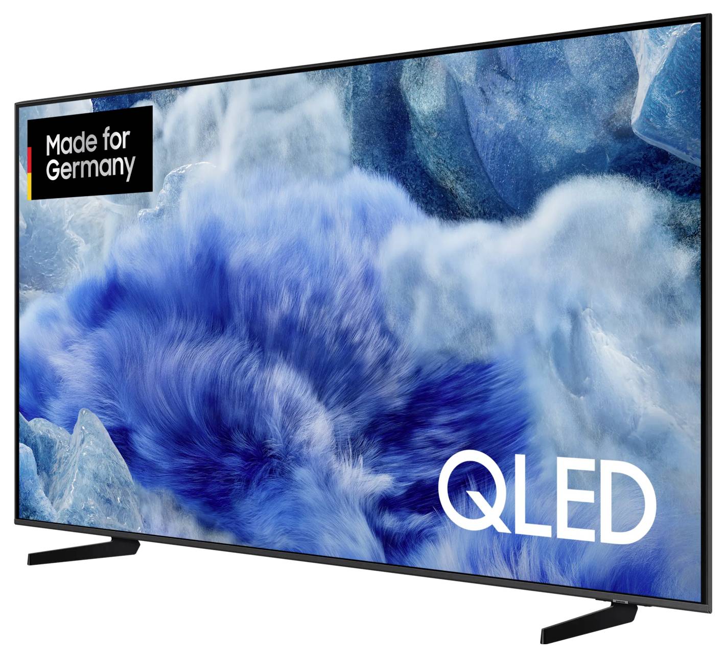 Plochý televízor s modrým, abstraktným pozadím. Nápis: 'Made for Germany', 'QLED'. Moderný dizajn, veľká obrazovka.