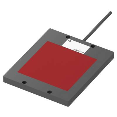 Plochý obdĺžnikový diel s červeným povrchom a káblom, pravdepodobne senzor alebo technická komponenta.