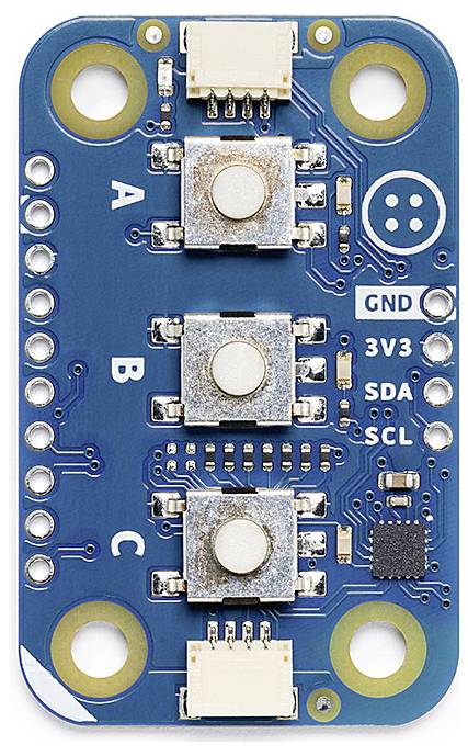 Modrý elektronický modul s tromi štvorcovými senzormi, označenými 'A', 'B', 'C'. Prípojky: GND, 3V3, SDA, SCL.