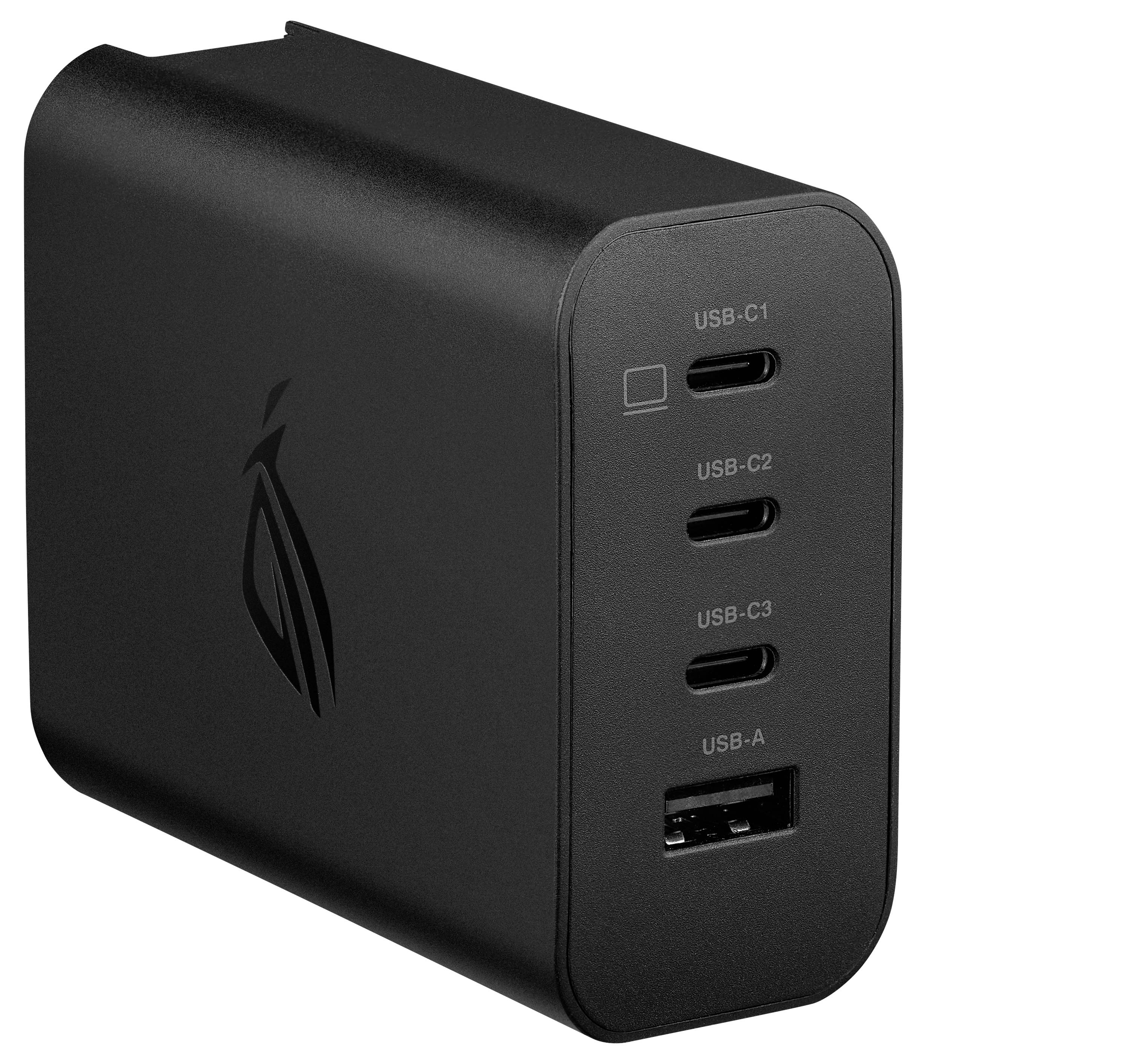 Čierny multifunkčný nabíjací adaptér s troma USB-C a jedným USB-A portom na boku.