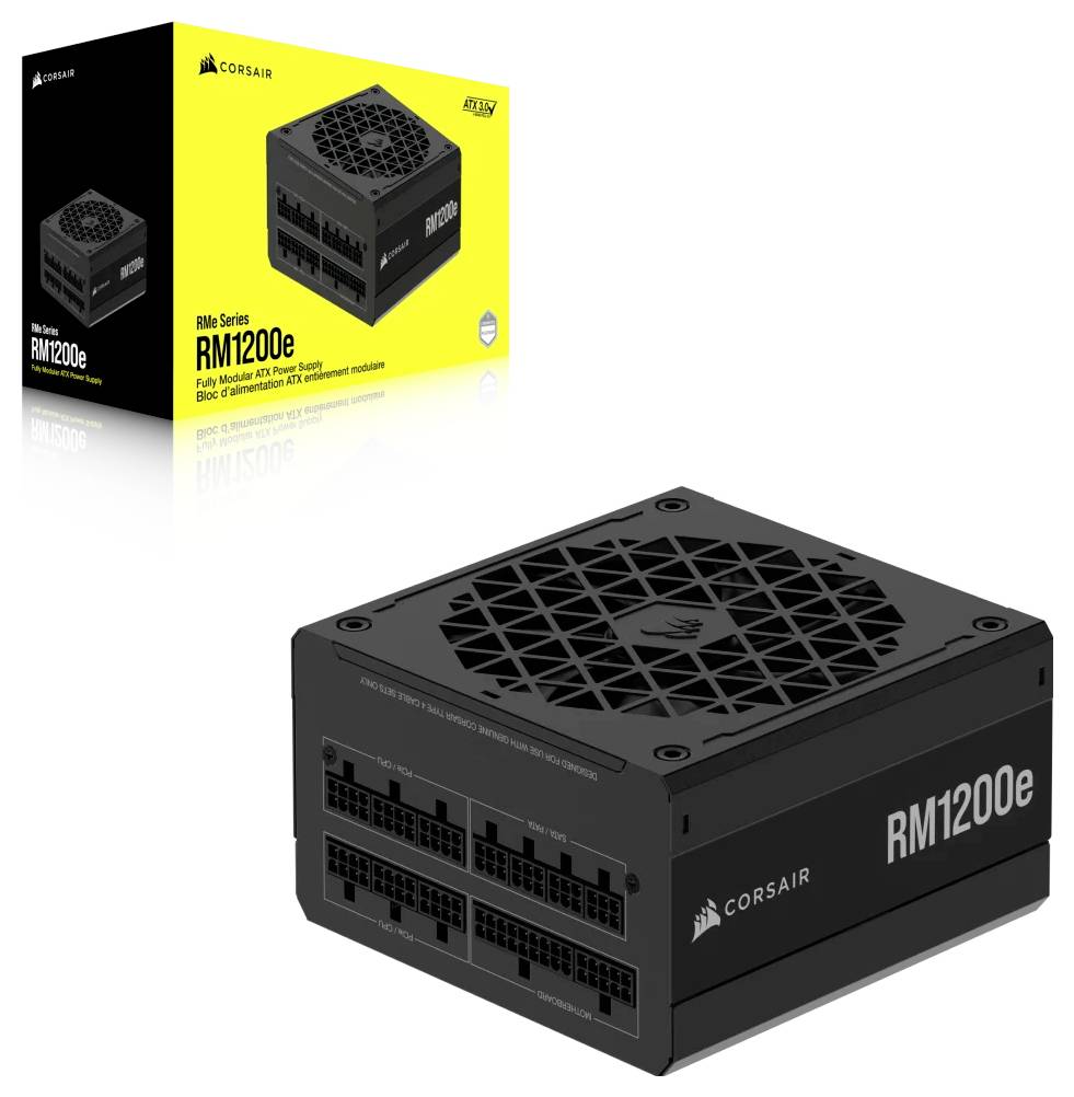Napájací zdroj 'Corsair RM1200e' predstavený, s viacerými pripájacími portami a chladiacim ventilátorom. Škatuľa od balenia viditeľná v pozadí.