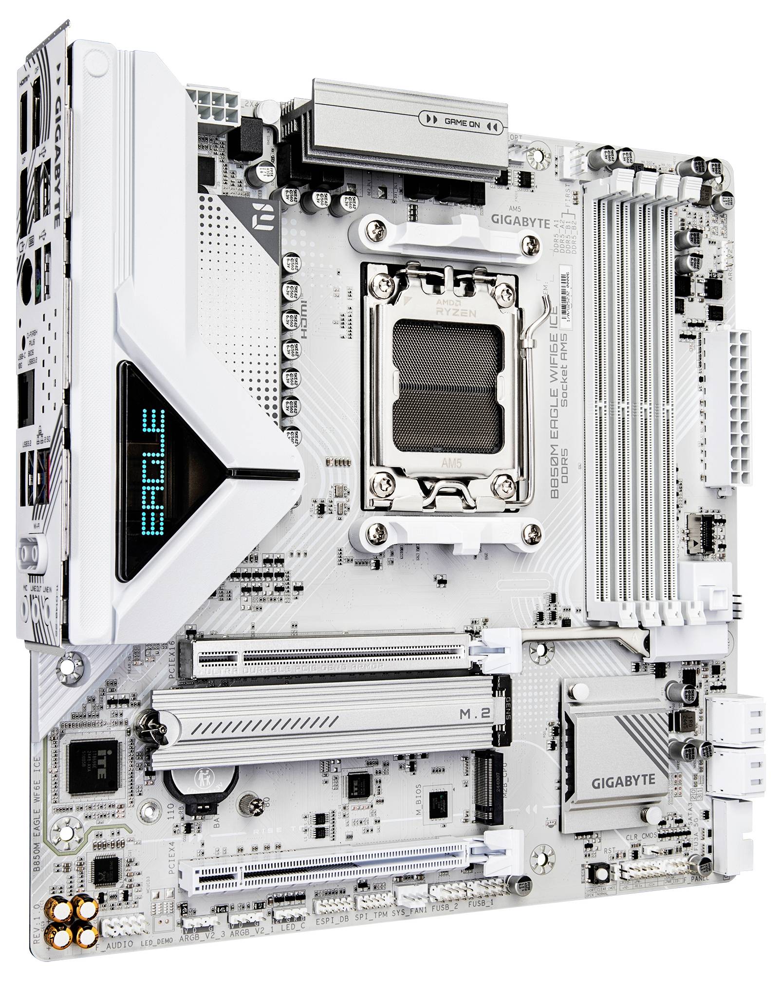 Biela počítačová základná doska s rôznymi slotmi a komponentmi, vrátaneSocketu pre CPU, slotov pre RAM a označených súčastí značky 'Gigabyte'.