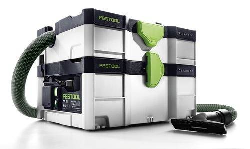 Kompaktný, prenosný Festool vysávač s elegantnným dizajnom, so zelenými akcentmi a pripojenou hadicou na bielom pozadí.
