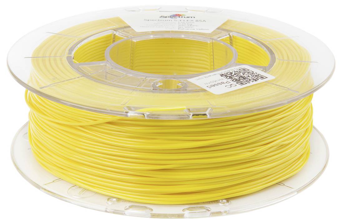 Špulka žltého 3D tlačového filamentu s priehľadným plastovým obalom, vhodná pre použitie v 3D tlačových projektoch.