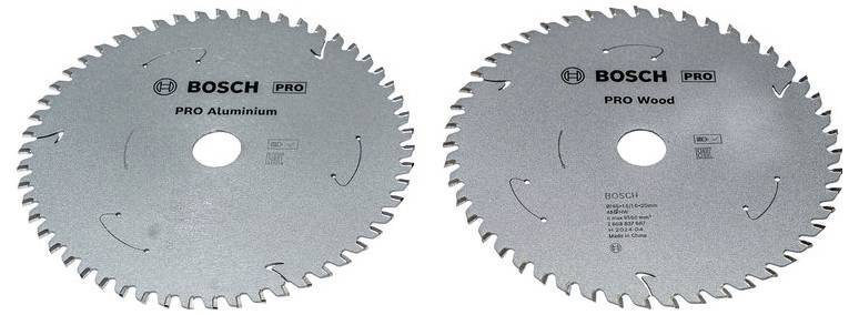 Dve kotúčové píly: jedna označená "PRO Hliník" na rezanie hliníka, druhá "PRO Drevo" na rezanie dreva. Obe od spoločnosti Bosch.