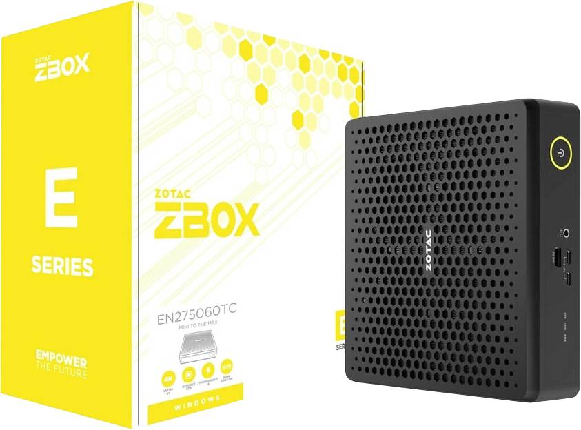 Obrázok zobrazuje mini počítač ZOTAC ZBOX E Series vedľa jeho žltého obalu. Na škatuli je text "Empower the Future".