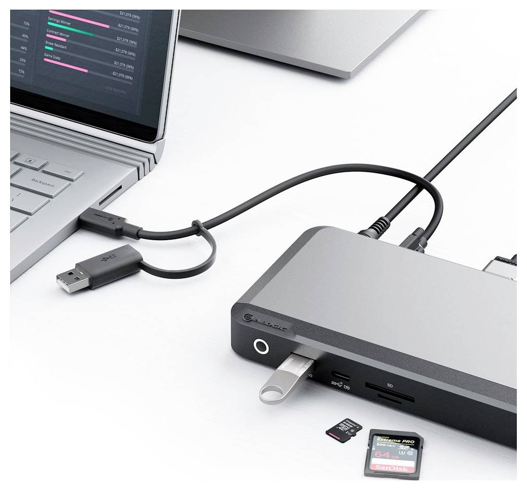 Dokovacia stanica pripojená k laptopom umožňuje pripojenie viacerých zariadení a zobrazuje porty USB a SD kariet s pripojenými zariadeniami.