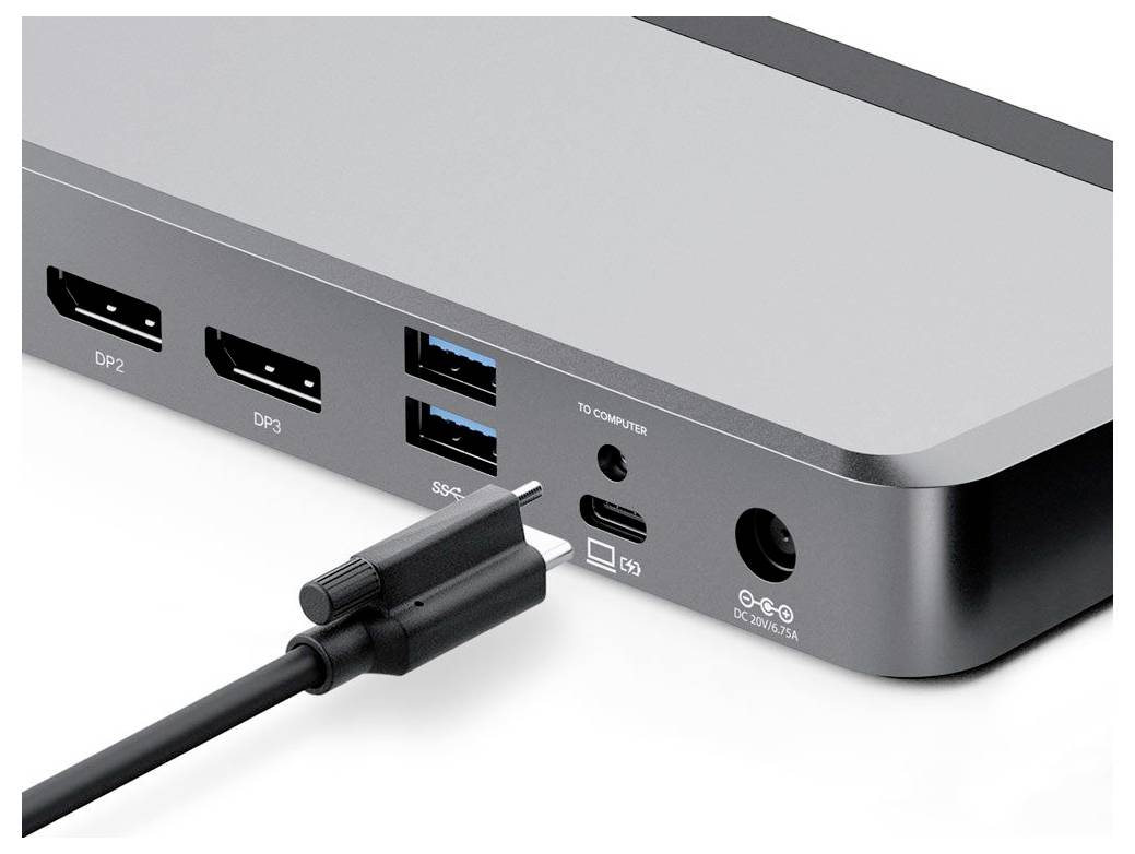 Dokovacia stanica s viacerými portami vrátane DisplayPortov, USB portov a napájacieho konektora, zobrazená s pripojeným USB-C káblom.