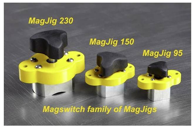 Rodina Magswitch MagJigs: Tri rôzne veľkosti (230, 150, 95) žltých a čiernych MagJigs umiestnených na kovovom povrchu.