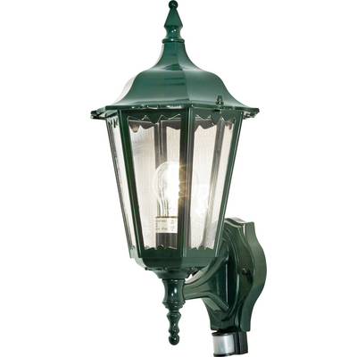 Zelená vintage vonkajšia nástenná lampa so svetlom, ktorá má dekoratívnu ozdobnú koncovku a priehľadné sklenené panely.