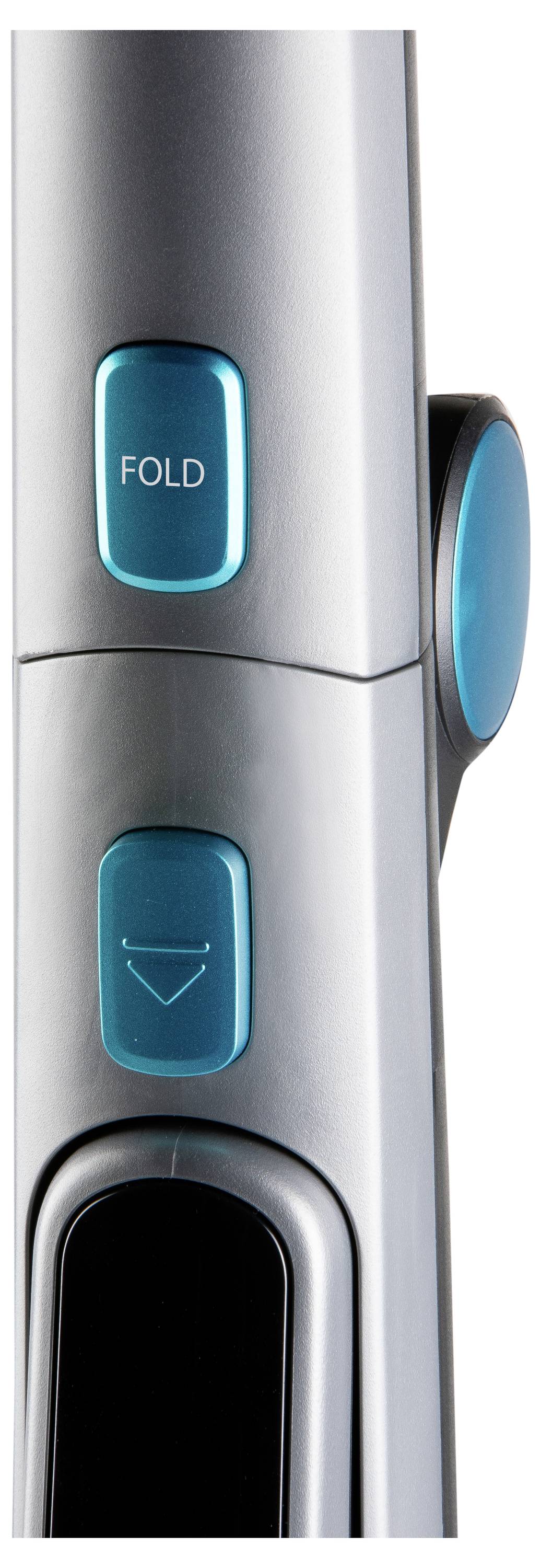 Detail blízkeho záberu mechanizmu skladania na kovovom zariadení s tyrkysovými tlačidlami označenými "FOLD" a so smerovou šípkou smerujúcou nadol.