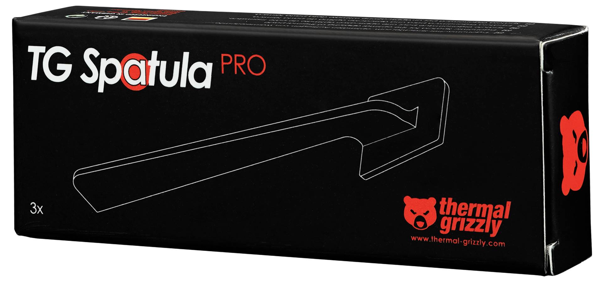 Krabica od 'TG Spatula PRO' od spoločnosti Thermal Grizzly, zobrazujúca obrys špachtle na čiernom pozadí.