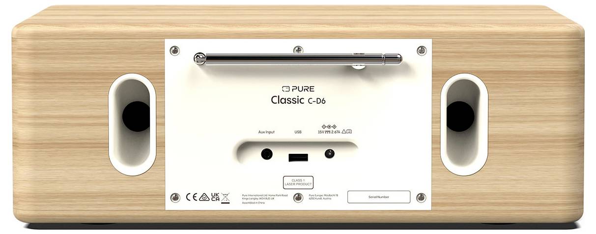 Obrázok zobrazuje zadný pohľad na audio zariadenie 'Pure Classic C-D6'. Má drevený kryt a rôzne vstupné/výstupné porty a ovládacie prvky.