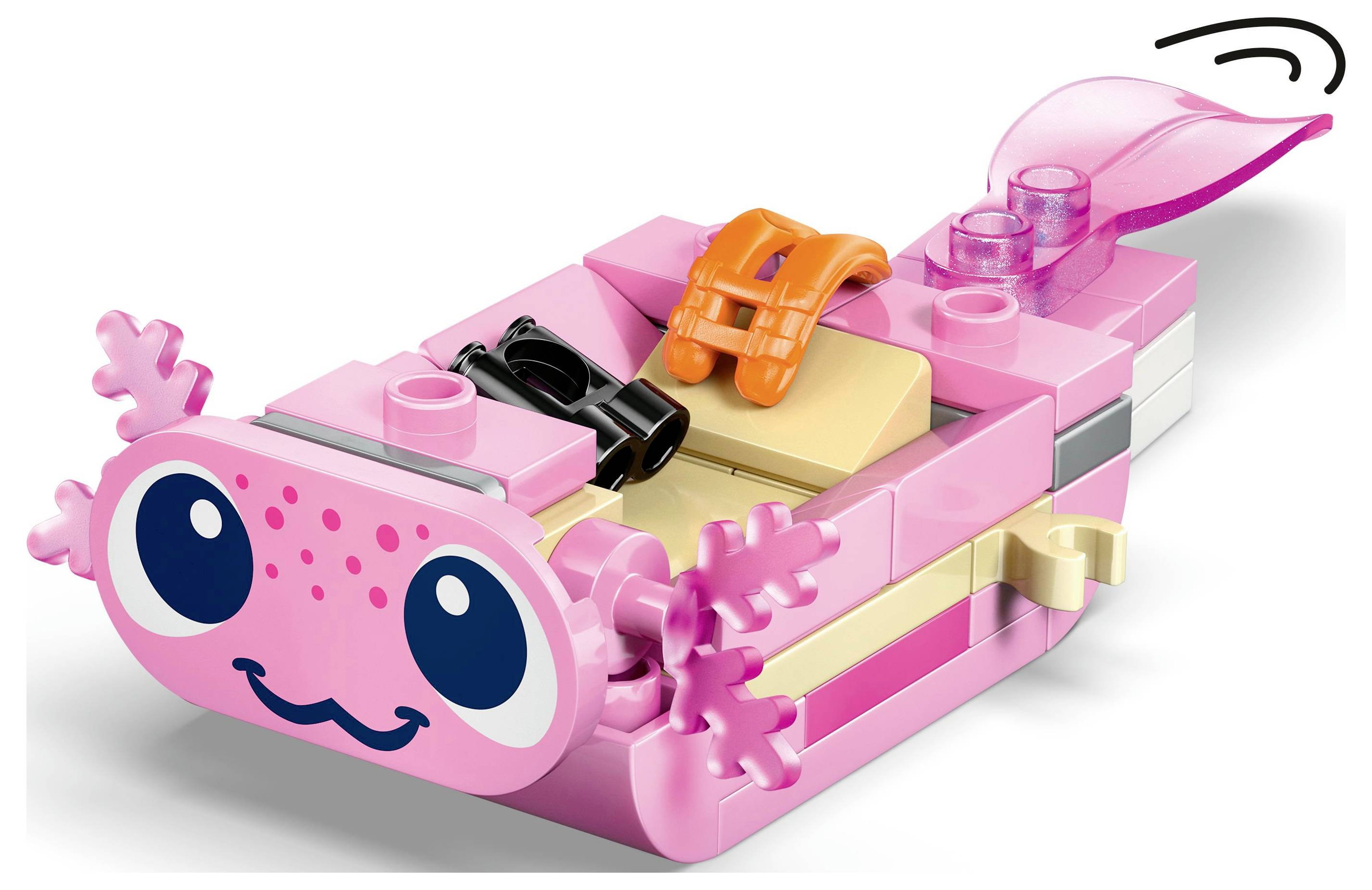 Malý, ružový LEGO model pripomínajúci axolotla, s úsmevnou tvárou a ozdobnými lemovanými okrajmi, s odnímateľnou oranžovo-čiernou súčasťou.