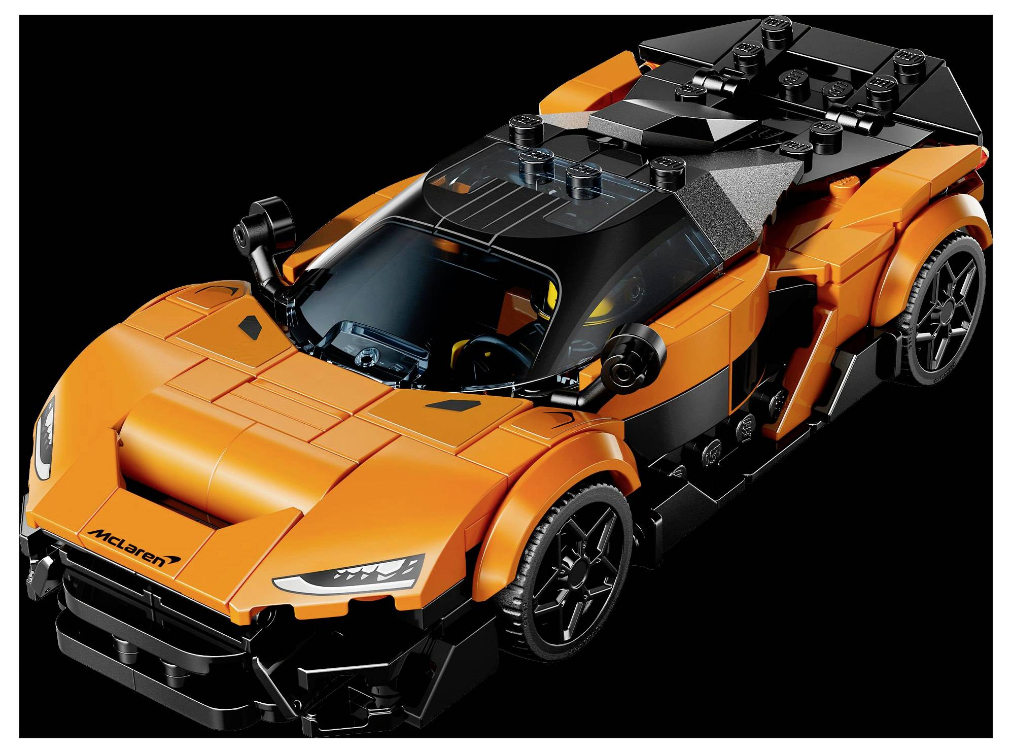 Oranžový a čierny model hračkárskeho auta pripomínajúci športové auto, vyznačujúci sa elegantným aerodynamickým dizajnom a emblémom 'McLaren' na prednej časti.
