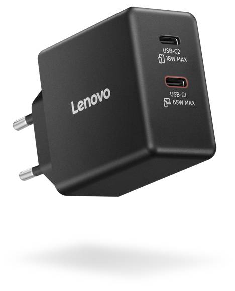 Čierny Lenovo dvojportový sieťový adaptér so štandardným európskym zástrčkovým adaptérom, vybavený dvomi USB-C portami označenými 'USB-C2 18W Max' a 'USB-C1 65W Max'.