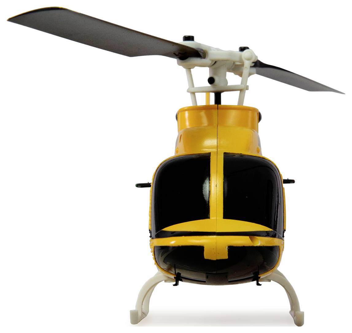 Žltá a čierna hračkárska helikoptéra zobrazená spredu, s rozloženými rotornými listami, položená na bielom povrchu.