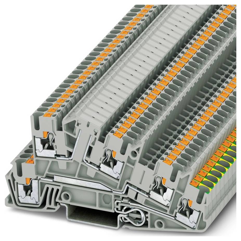 Kopa sivých elektrickými svorkovnicami s oranžovými pákami, používaných na pripájanie elektrických obvodov v panelových inštaláciách.