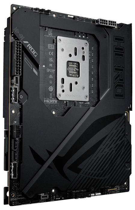 Základná doska mierne naklonená, zobrazujúca porty a sloty. Dizajn zahŕňa slovo 'HERO' a logo 'ROG', čo naznačuje zameranie na herné použitie.