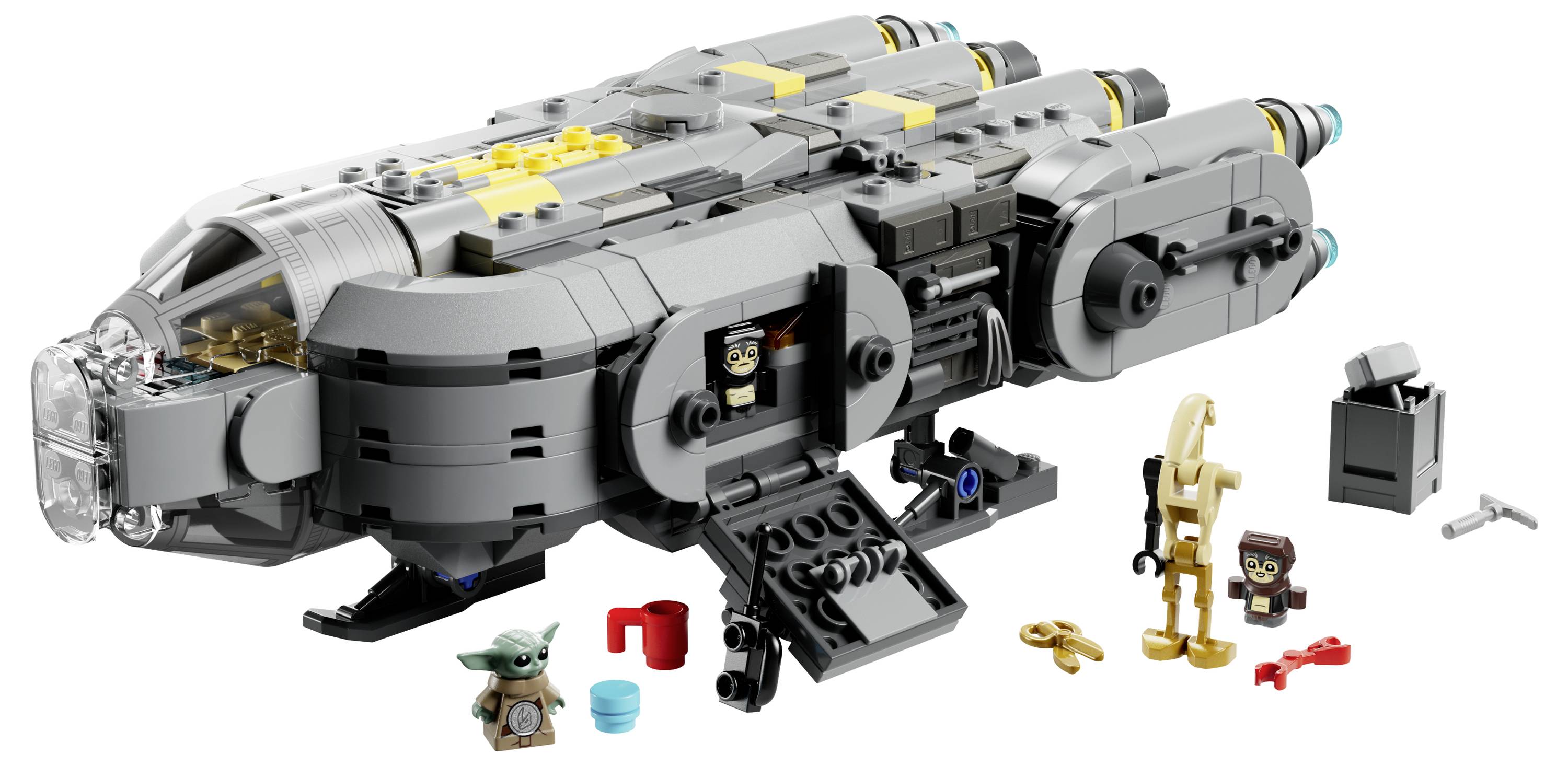 LEGO vesmírna loď s detailnými komponentmi, vrátane dvoch minifigúrok, malej zelenej figúrky a príslušenstva ako miska a kľúč.