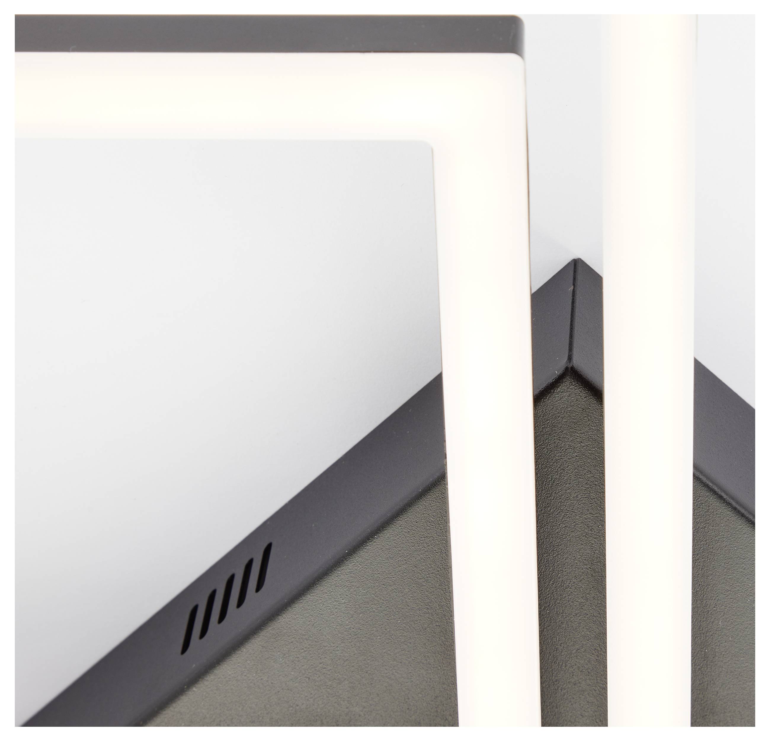 Detailný záber moderného LED svietidla s geometrickým dizajnom, s prekrývajúcimi sa rámami a elegantným, minimalistickým prevedením.