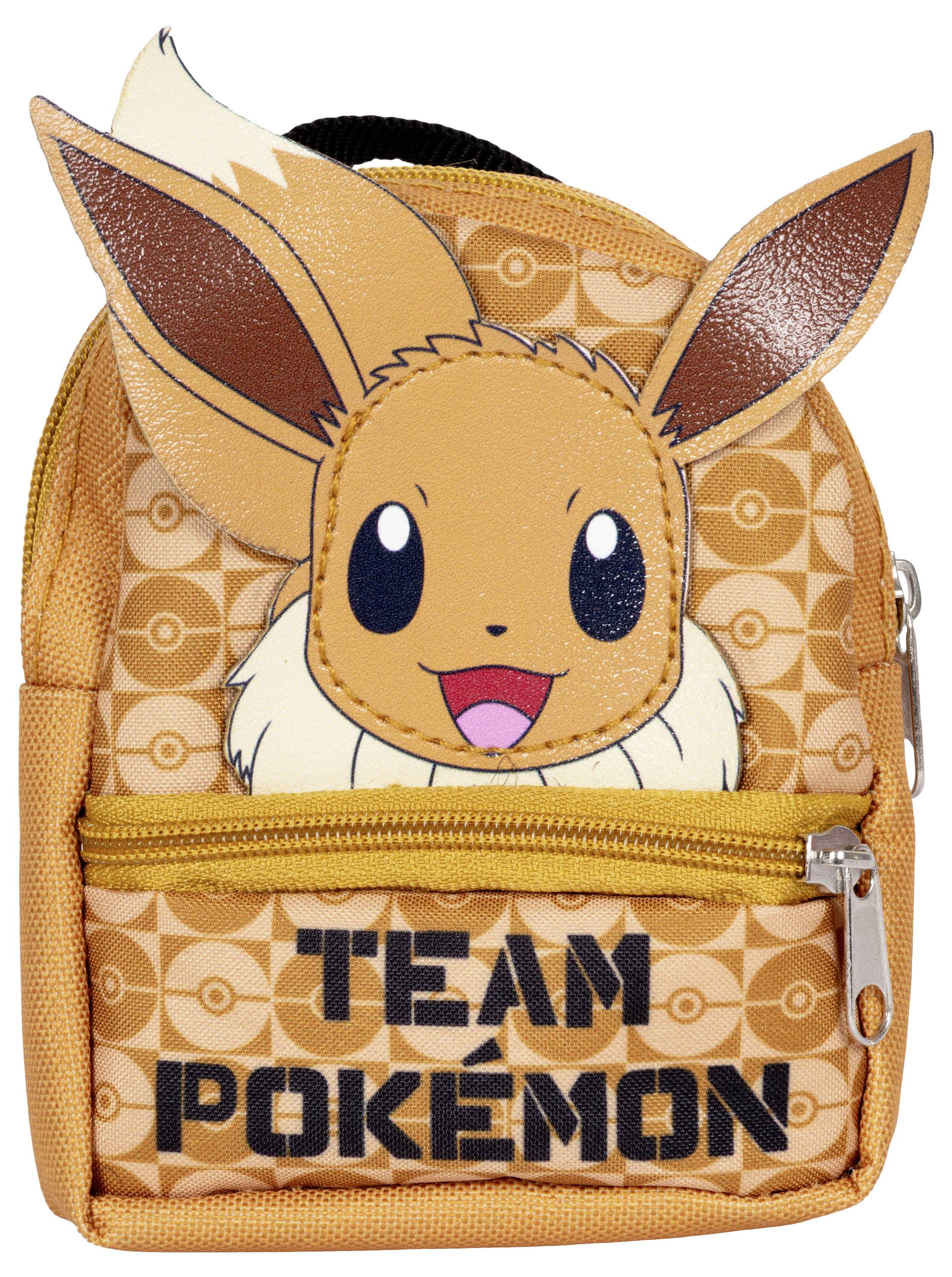 Oranžový batoh s obrázkom kreslených zvierat s veľkými ušami, úsmevom a textom „Team Pokemon" na prednom vrecku.
