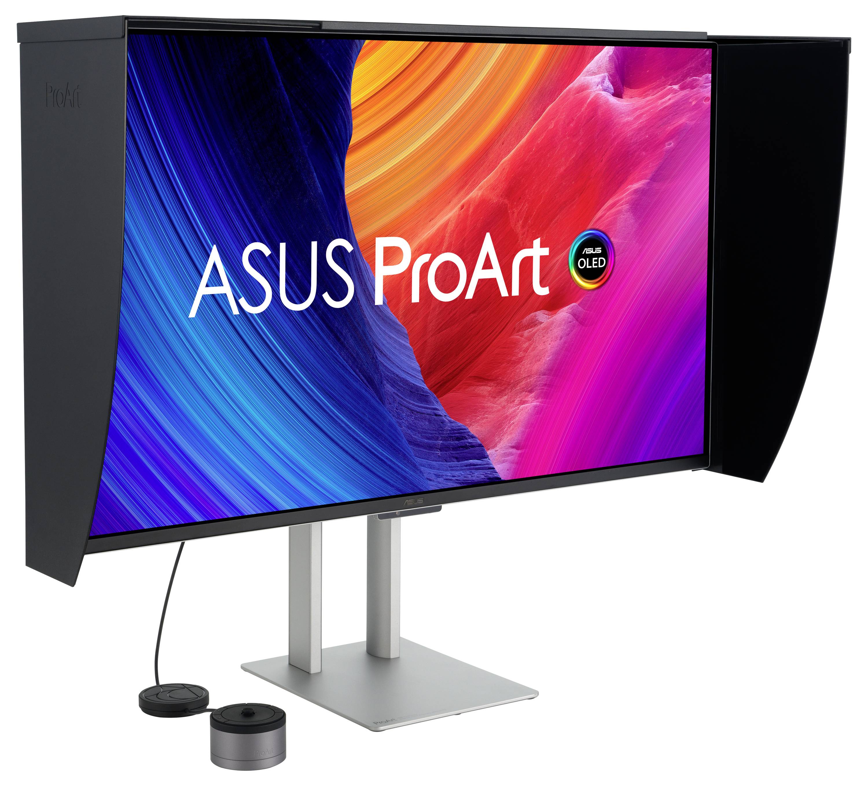 Počítačový monitor zobrazujúci vibrantné, abstraktné farby s textom „ASUS ProArt" v strede. Má bočné panely a elegantný stojan.