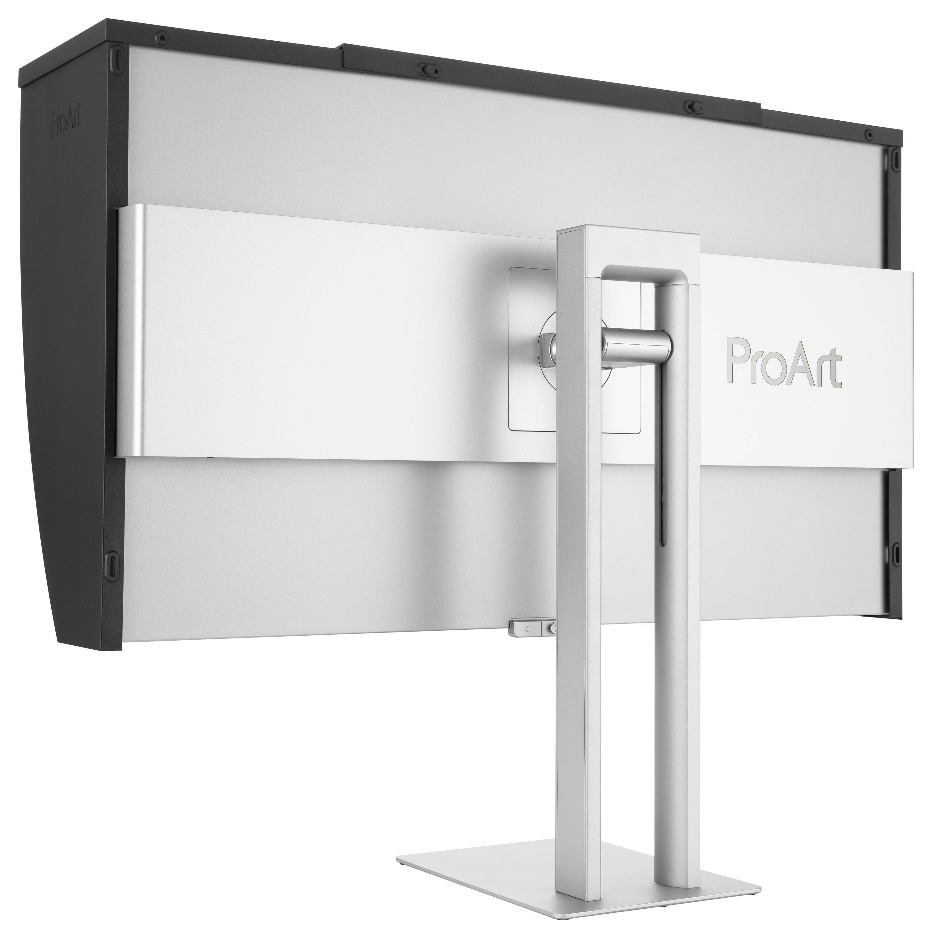 Monitor „ProArt" zobrazený zozadu s elegantným strieborným stojanom a tmavým rámom. Navrhnutý pre stabilitu a moderný vzhľad.