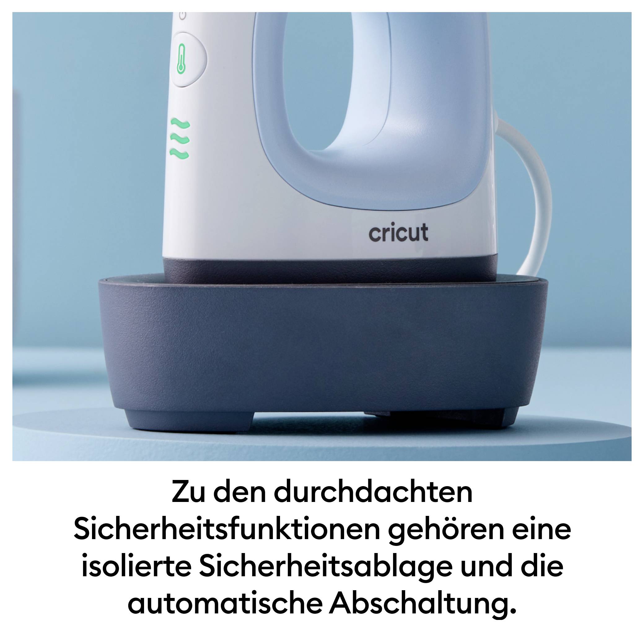 Žehlička na sivej základni s nápisom „cricut". Text pod ním vysvetľuje bezpečnostné funkcie zariadenia.
