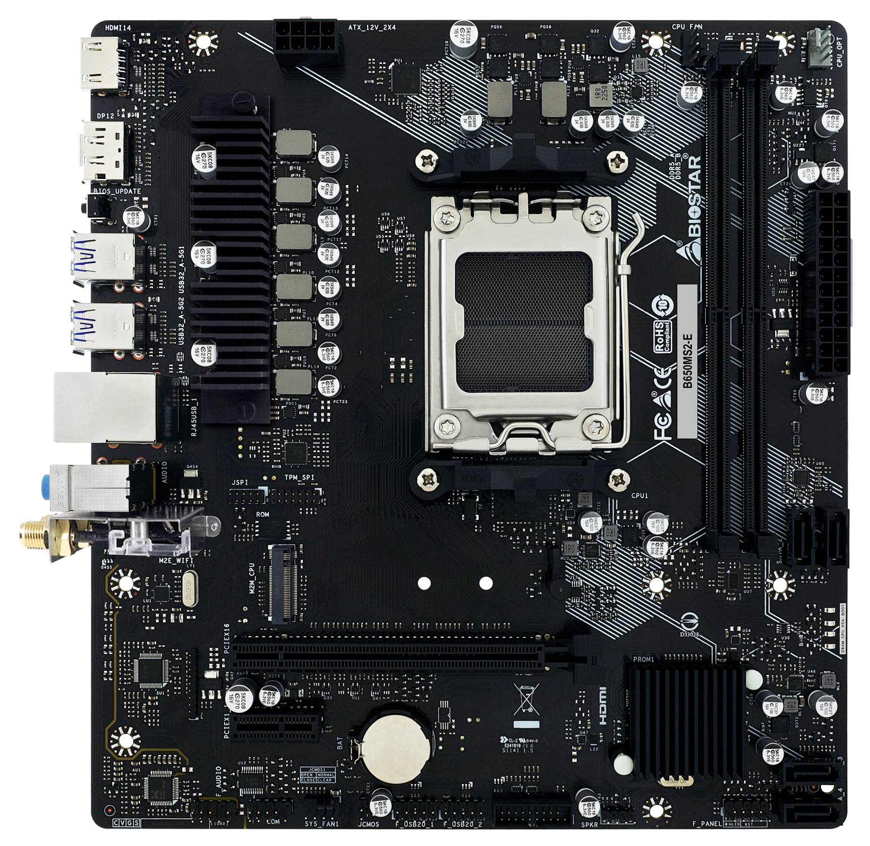 Čierna počítačová základná doska Biostar s centrálnym soketu CPU, slotmi RAM, slotmi PCIe, chladičmi, zadnými portami a konektormi napájania.