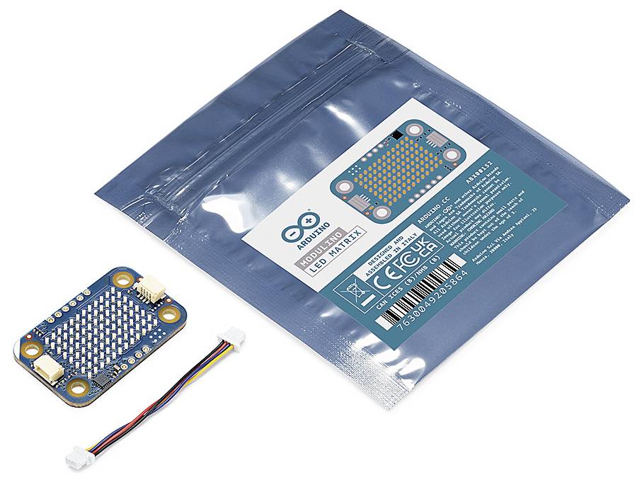Modrá antistatiká taška s nálepkou na „NeoPixel LED Matrix" ovládací dosku, zobrazená s malou LED maticovou doskou a pripájacím kábalom vedľa nej.