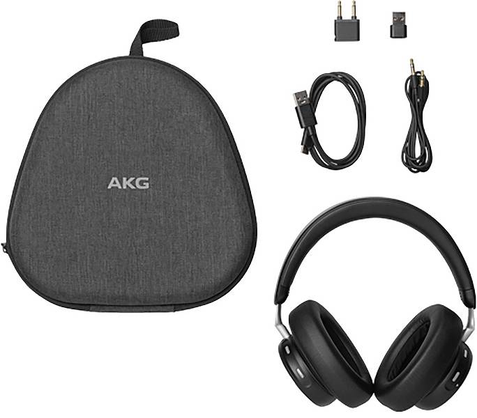 Bezdrôtové slúchadlá AKG cez ucho zobrazené s puzdrom na prepravu, USB kablom, audio kablom a adaptérom na lietadlo.