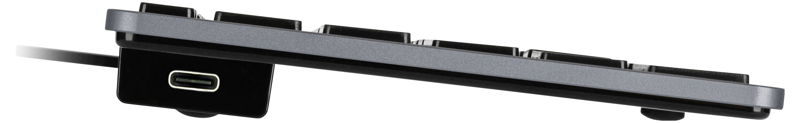 Bočný pohľad na príslušenstvo na dokovanie/nabíjanie smartfónu s portom USB-C, ktorý zobrazuje jeho štíhly čierny dizajn a rozhranie pripojenia.