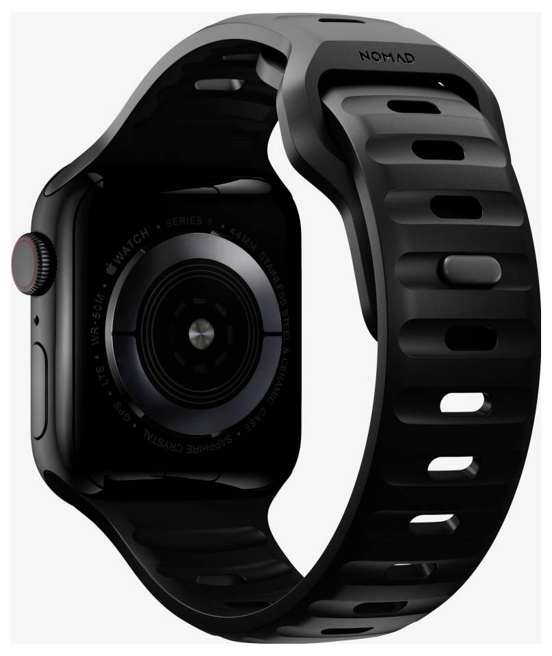 Čierne Apple Watch s čiernym NOMAD športovým remienkom, zobrazené v zblízka na svetlom pozadí.