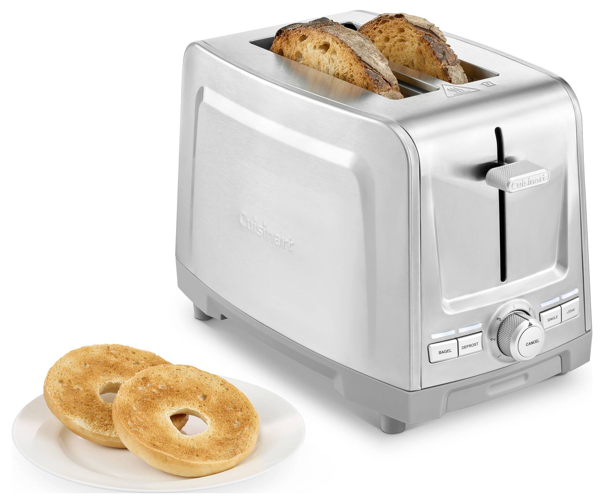 Nerezový hriankovač s dvoma krajcami chleba a tanier s dvoma bagelmi vedľa neho.