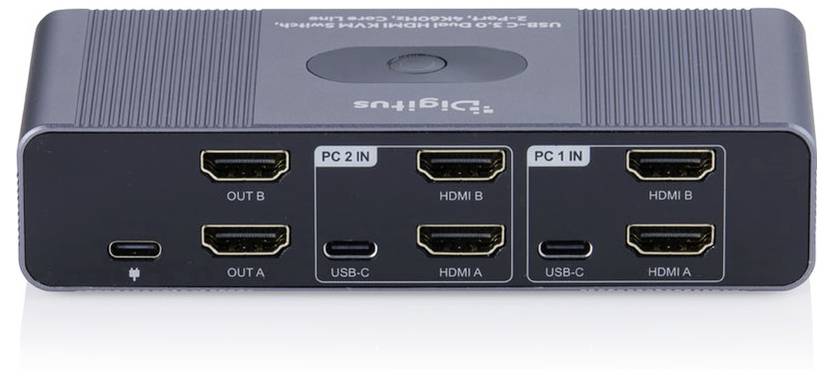 Čierna krabica prepínača/rozdelávača HDMI od spoločnosti Tripp Lite s označenými portmi "PC 2 IN", "PC 1 IN" a výstupmi, zobrazujúca viacero pripojení HDMI a USB-C.
