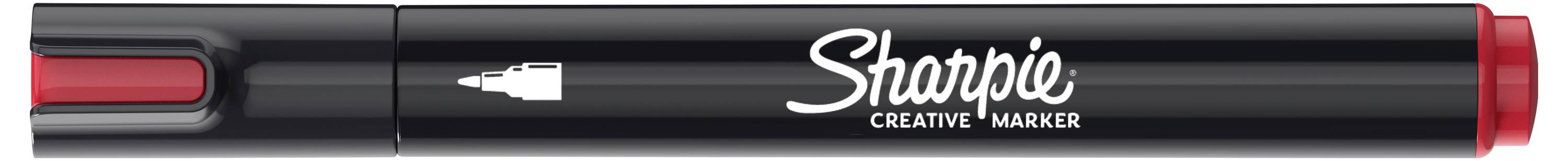 Zblízka čiernky Sharpie Creative Marker s čiernymi zvyškami a červenými akcentmi na uzávere, zobrazená horizontálne.