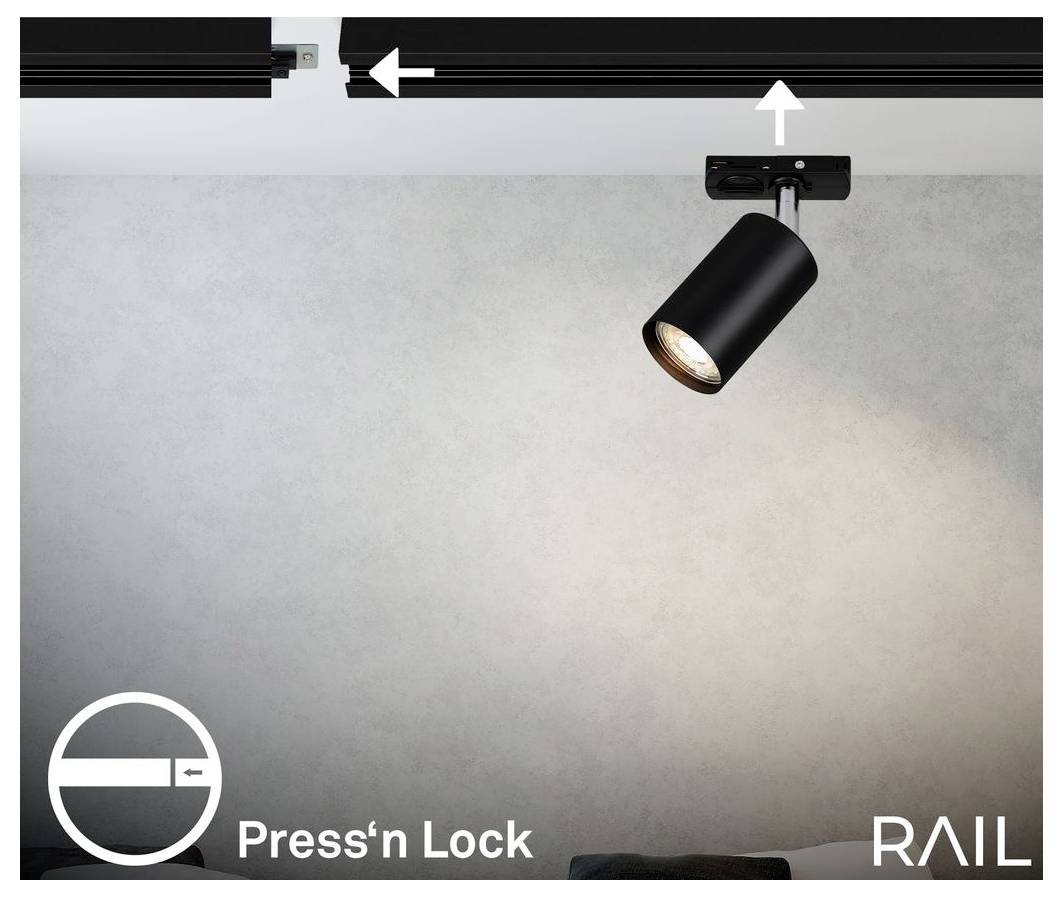 Čierny reflektor na koľajnici s šípkami ukazujúcimi inštaláciu na stlačenie a zámok; označený "Press'n Lock" a "RAIL".