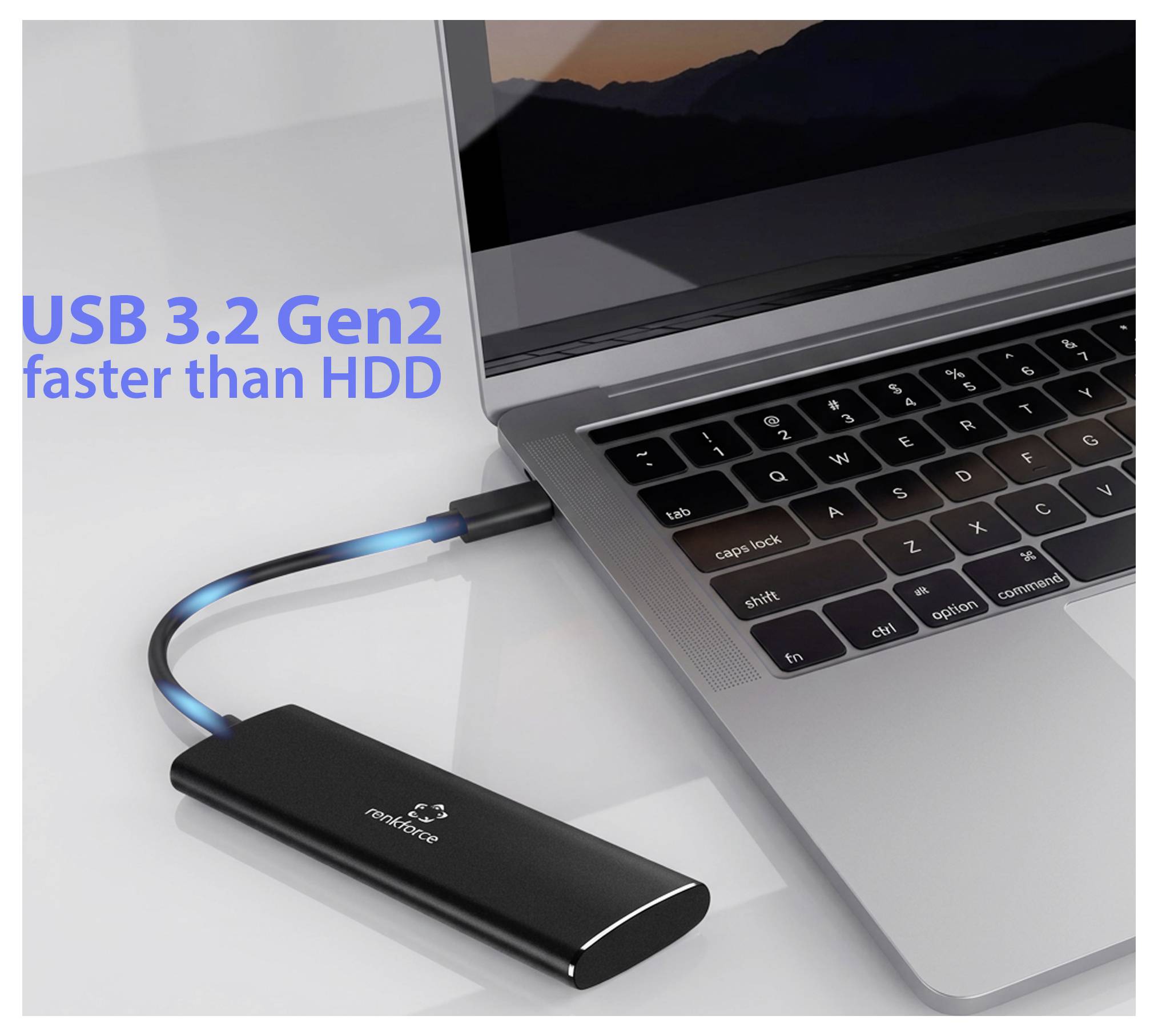 Notebook pripojený cez USB-C k externej SSD s textom „USB 3.2 Gen2 rýchlejší ako HDD" propagujúci rýchlejší prenos údajov.
