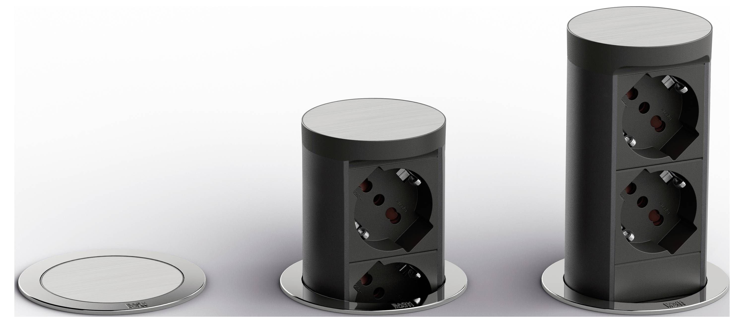 Trojstupňová pop-up zásuvka: uzavretý disk vľavo, čiastočne vysunutý stĺpec zásuvky v strede, plne roztiahnutý duálny stĺpec zásuvky vpravo.